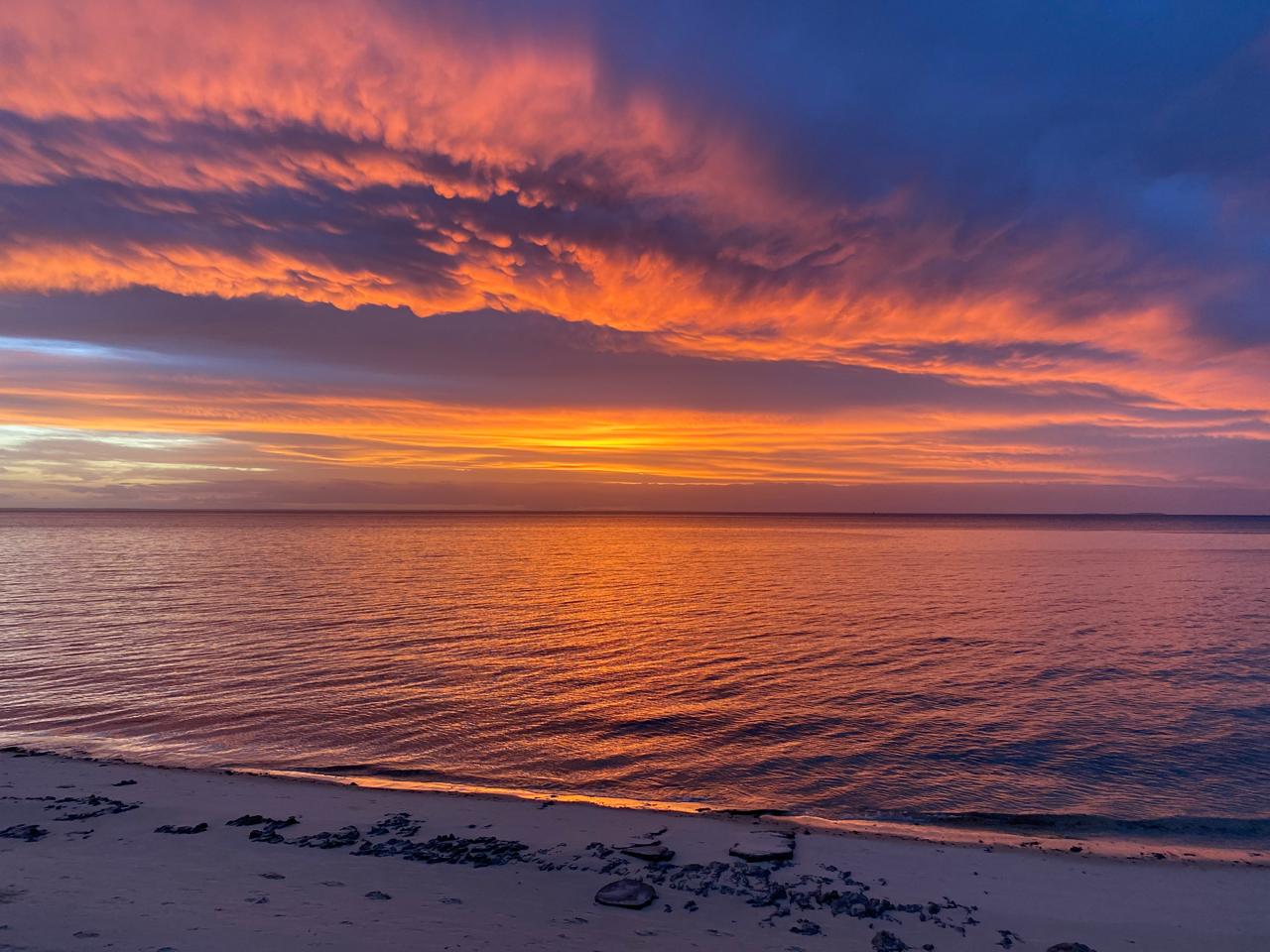 Dramatic orange and purple Indian Ocean sunset over Vilanculos